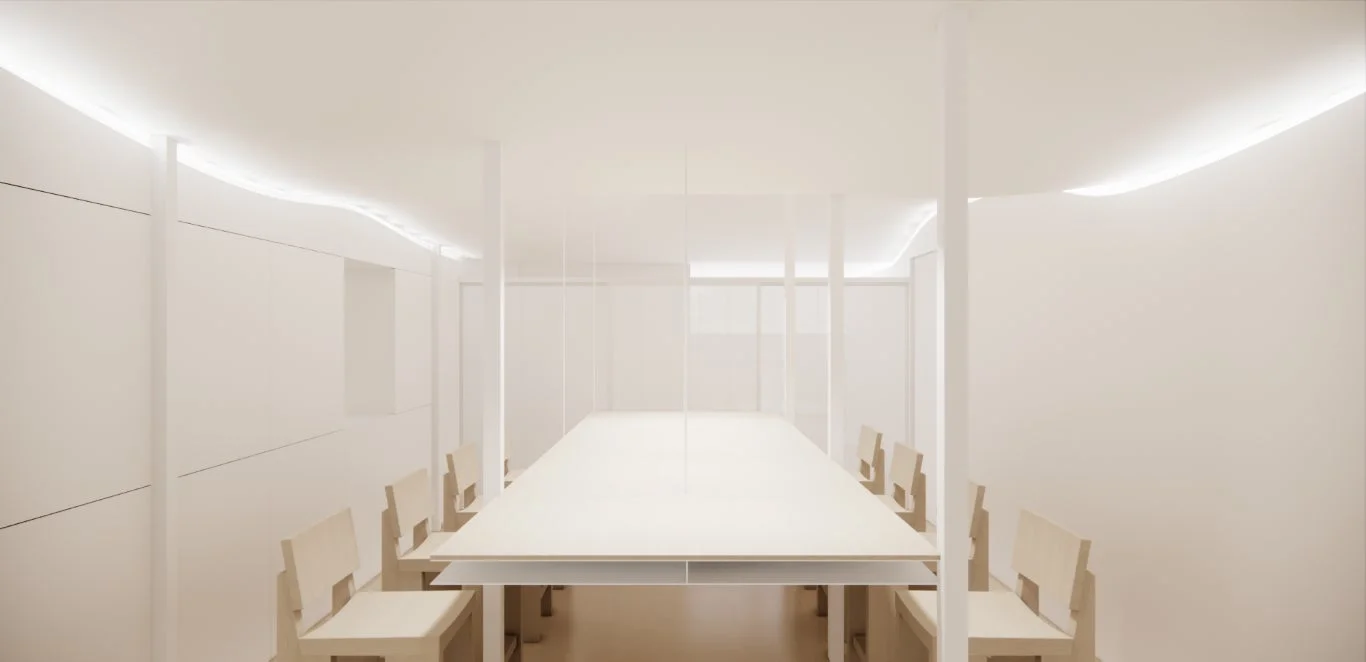 白を基調としたミニマリストな会議室の内部。