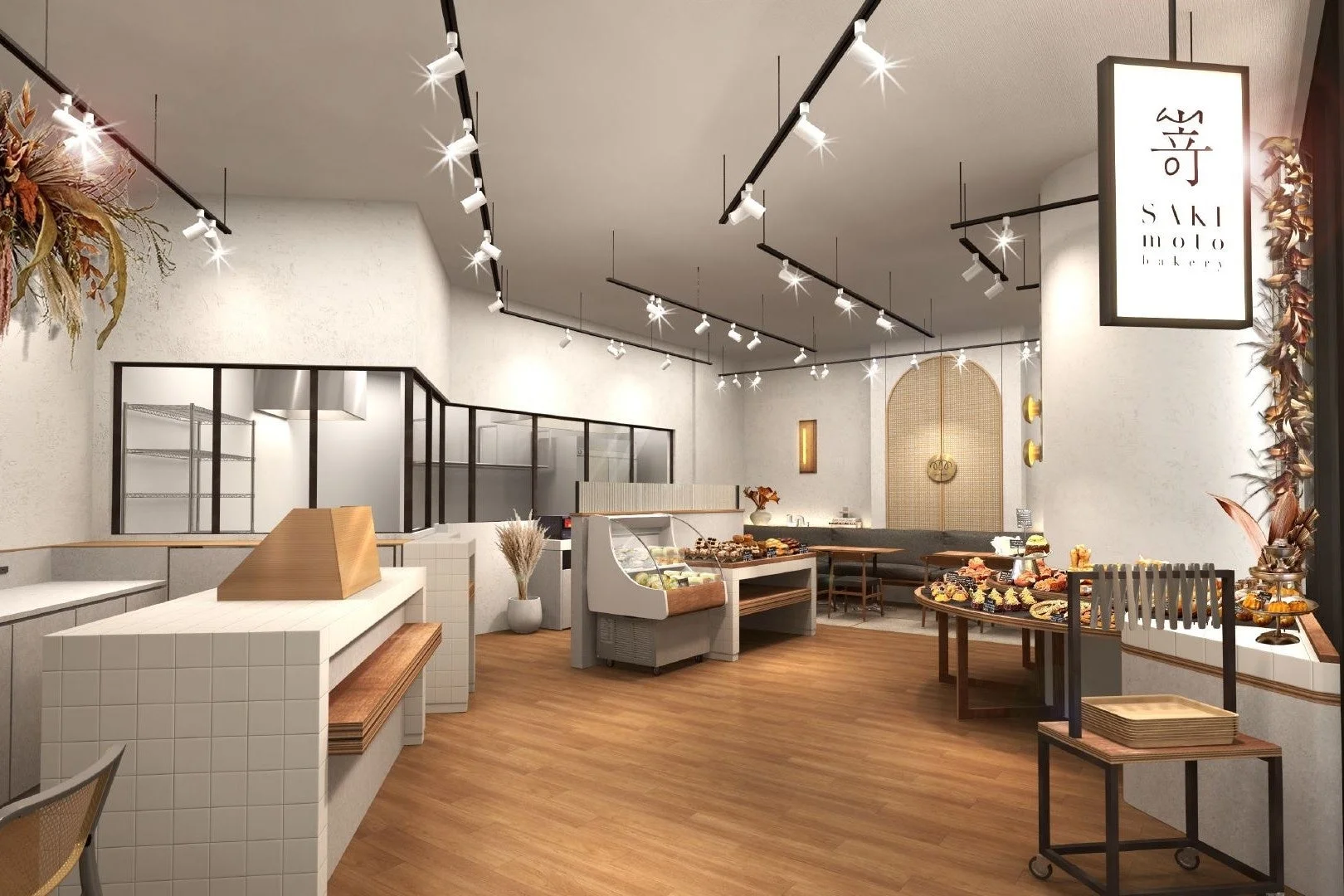高級食パン専門店「SAKI moto bakery」のモダンで清潔感のある店内。様々なパンや焼き菓子が美しく陳列され、カフェスペースも併設された明るく inviting な空間です。