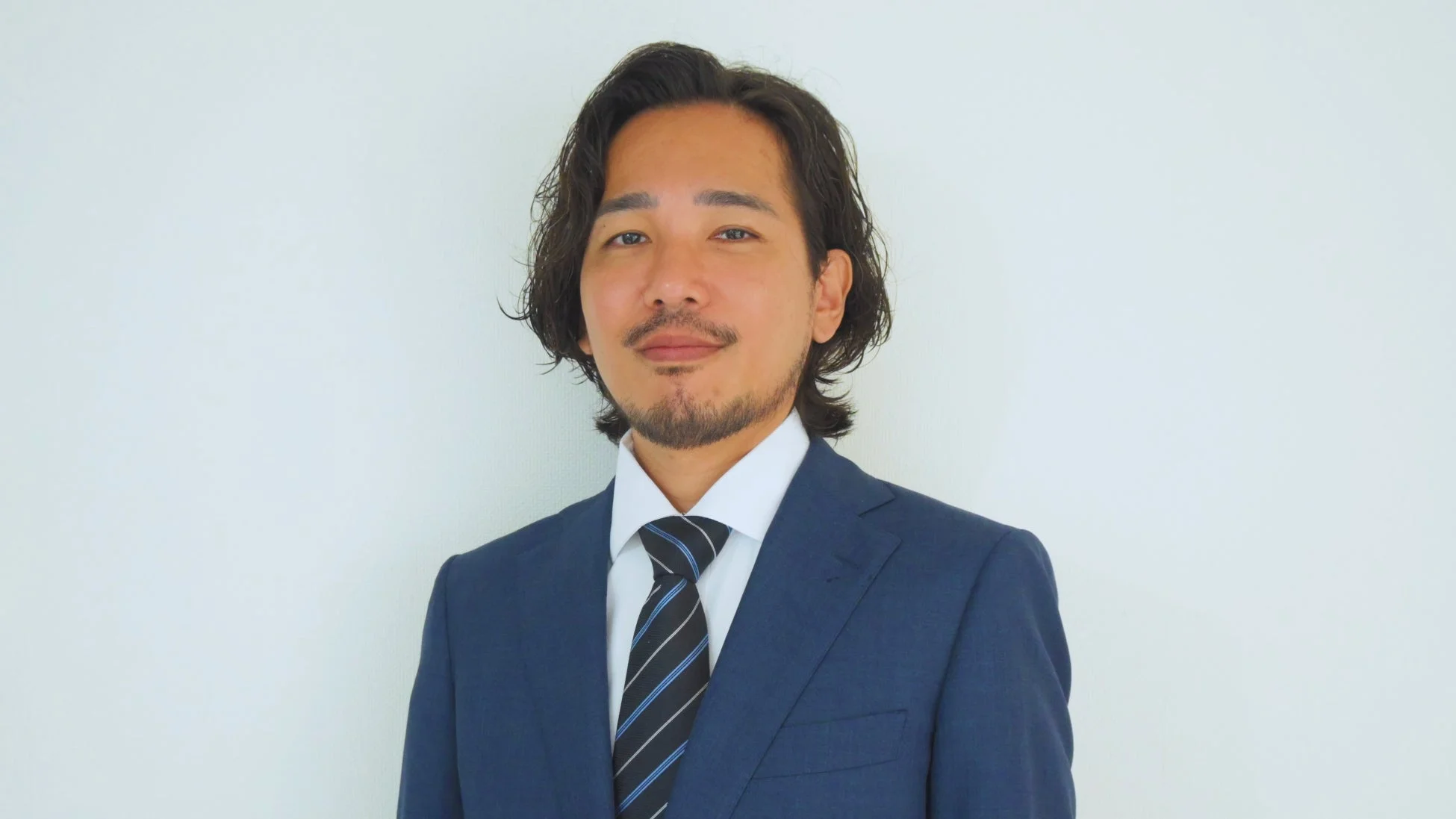 ベイワークス株式会社 代表取締役社長 河野陽介氏のポートレート